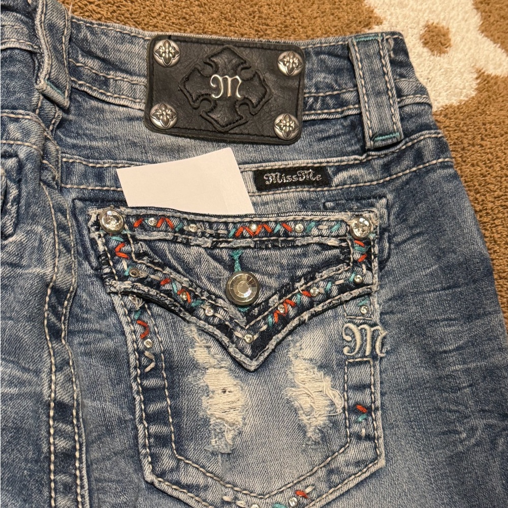 Miss Me Signature Boot Cut Jeans.